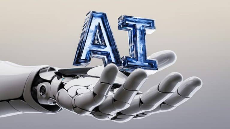 Robotic hand holding the letters "AI" in ice. AI in the changing world of work.