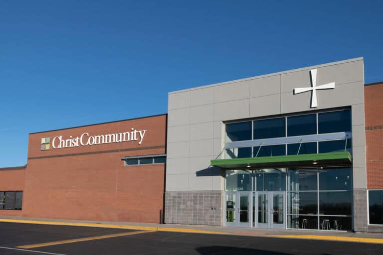 Christ Community Church building exterior with modern architecture and a prominent cross.