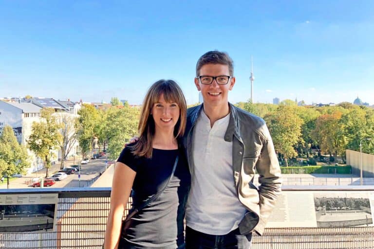 Couple in Berlin, Germany, with the Berlin TV Tower in the background.
