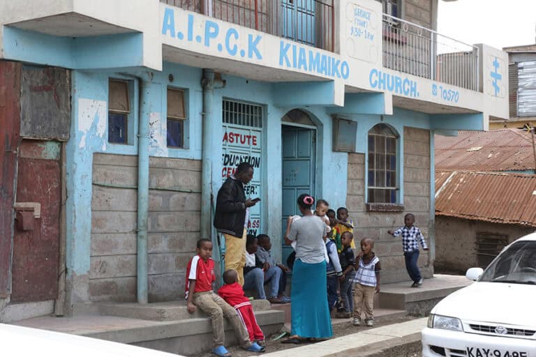A.I.P.C.K Kiamaiko Church with people outside. Outreach in action.