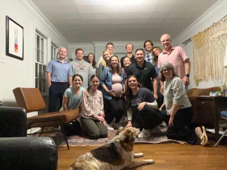 Group photo at Brookside Campus with a pregnant woman and a dog